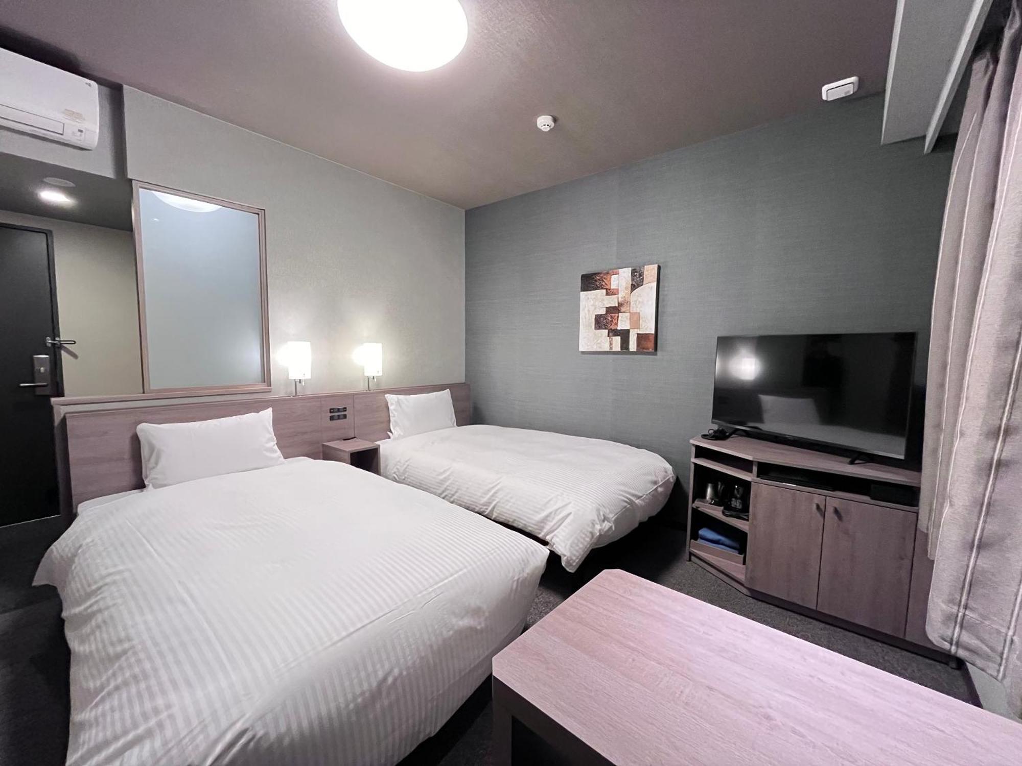 Hotel Route Inn Kuwana Esterno foto